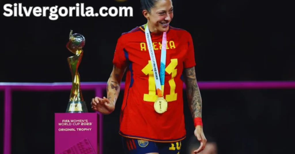 a person wearing a red jersey and a gold medal